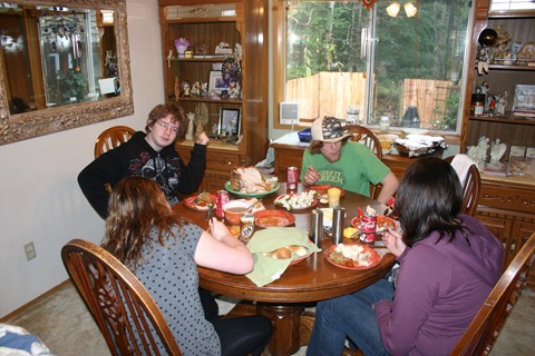 The kids eat Thanksgiving Dinner at our house