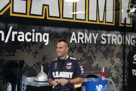 Tony Schumacher in the pits, signing autographs